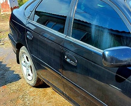 Черный Тойота Авенсис, объемом двигателя 1.8 л и пробегом 250 тыс. км за 2700 $, фото 1 на Automoto.ua