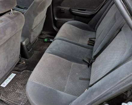 Черный Тойота Авенсис, объемом двигателя 2 л и пробегом 300 тыс. км за 3500 $, фото 3 на Automoto.ua