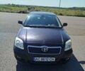 Черный Тойота Авенсис, объемом двигателя 2 л и пробегом 425 тыс. км за 4700 $, фото 1 на Automoto.ua