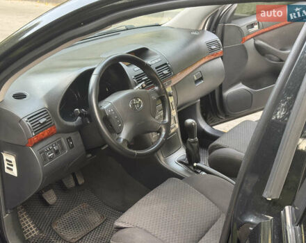 Черный Тойота Авенсис, объемом двигателя 2 л и пробегом 280 тыс. км за 6300 $, фото 9 на Automoto.ua