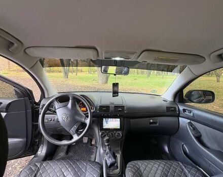 Черный Тойота Авенсис, объемом двигателя 2 л и пробегом 230 тыс. км за 5500 $, фото 1 на Automoto.ua