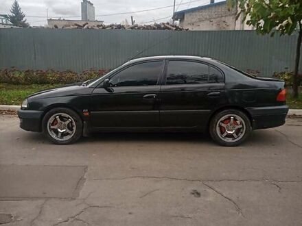 Тойота Авенсіс 1998 у Черкасах на Automoto.ua Чорний Тойота Авенсіс, об'ємом двигуна 2 л та пробігом 400 тис. км за 3500 $, фото 1 на Automoto.ua