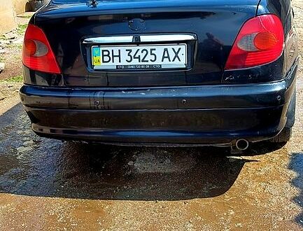 Черный Тойота Авенсис, объемом двигателя 1.8 л и пробегом 250 тыс. км за 2700 $, фото 1 на Automoto.ua