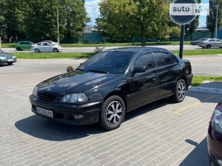 Черный Тойота Авенсис, объемом двигателя 2 л и пробегом 522 тыс. км за 2900 $, фото 1 на Automoto.ua