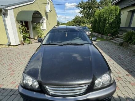 Черный Тойота Авенсис, объемом двигателя 1.6 л и пробегом 373 тыс. км за 3500 $, фото 1 на Automoto.ua