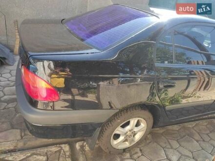 Черный Тойота Авенсис, объемом двигателя 2 л и пробегом 375 тыс. км за 3479 $, фото 1 на Automoto.ua