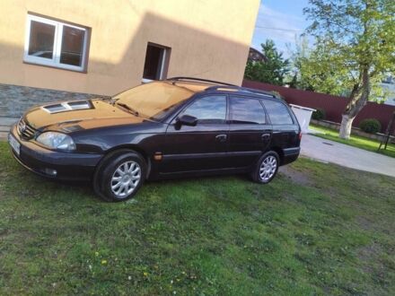 Черный Тойота Авенсис, объемом двигателя 1.8 л и пробегом 345 тыс. км за 2550 $, фото 1 на Automoto.ua