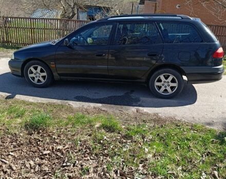 Чорний Тойота Авенсіс, об'ємом двигуна 1.8 л та пробігом 204 тис. км за 4300 $, фото 1 на Automoto.ua