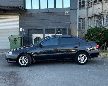 Черный Тойота Авенсис, объемом двигателя 2 л и пробегом 400 тыс. км за 2899 $, фото 1 на Automoto.ua