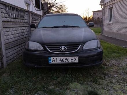 Черный Тойота Авенсис, объемом двигателя 2 л и пробегом 300 тыс. км за 3500 $, фото 1 на Automoto.ua