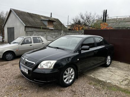 Черный Тойота Авенсис, объемом двигателя 2 л и пробегом 300 тыс. км за 4200 $, фото 1 на Automoto.ua