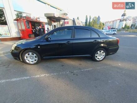 Чорний Тойота Авенсіс, об'ємом двигуна 2 л та пробігом 257 тис. км за 5800 $, фото 1 на Automoto.ua