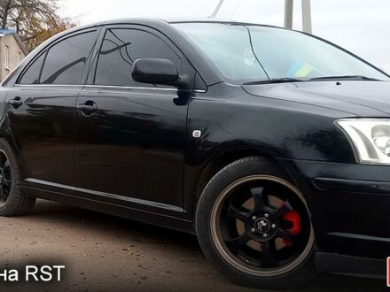 Черный Тойота Авенсис, объемом двигателя 1.8 л и пробегом 290 тыс. км за 6000 $, фото 1 на Automoto.ua