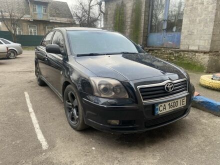 Черный Тойота Авенсис, объемом двигателя 1.8 л и пробегом 350 тыс. км за 550 $, фото 1 на Automoto.ua