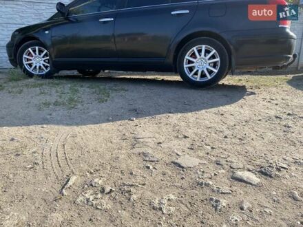 Черный Тойота Авенсис, объемом двигателя 1.79 л и пробегом 224 тыс. км за 6999 $, фото 1 на Automoto.ua