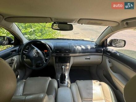 Черный Тойота Авенсис, объемом двигателя 2 л и пробегом 296 тыс. км за 5800 $, фото 1 на Automoto.ua