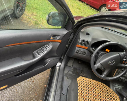 Черный Тойота Авенсис, объемом двигателя 1.8 л и пробегом 150 тыс. км за 7700 $, фото 1 на Automoto.ua