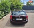 Фиолетовый Тойота Авенсис, объемом двигателя 2 л и пробегом 270 тыс. км за 7500 $, фото 4 на Automoto.ua