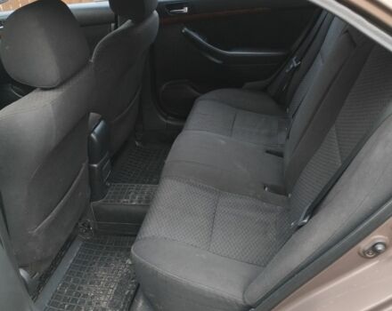 Коричневый Тойота Авенсис, объемом двигателя 2 л и пробегом 236 тыс. км за 5200 $, фото 4 на Automoto.ua