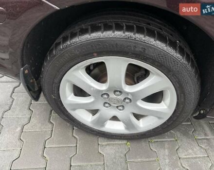 Коричневый Тойота Авенсис, объемом двигателя 2 л и пробегом 139 тыс. км за 8600 $, фото 6 на Automoto.ua