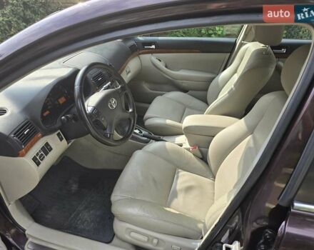 Коричневый Тойота Авенсис, объемом двигателя 2 л и пробегом 139 тыс. км за 7900 $, фото 10 на Automoto.ua