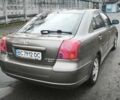 Коричневый Тойота Авенсис, объемом двигателя 2 л и пробегом 370 тыс. км за 4500 $, фото 3 на Automoto.ua