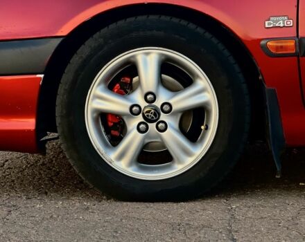 Красный Тойота Авенсис, объемом двигателя 2 л и пробегом 314 тыс. км за 3800 $, фото 9 на Automoto.ua