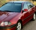 Красный Тойота Авенсис, объемом двигателя 2 л и пробегом 314 тыс. км за 3800 $, фото 2 на Automoto.ua