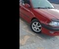 Красный Тойота Авенсис, объемом двигателя 1.8 л и пробегом 319 тыс. км за 3200 $, фото 1 на Automoto.ua