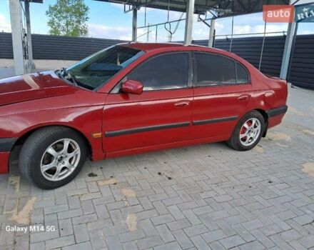 Красный Тойота Авенсис, объемом двигателя 1.8 л и пробегом 319 тыс. км за 3200 $, фото 2 на Automoto.ua