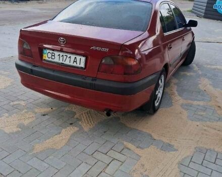 Красный Тойота Авенсис, объемом двигателя 1.8 л и пробегом 319 тыс. км за 3200 $, фото 5 на Automoto.ua