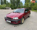 Красный Тойота Авенсис, объемом двигателя 1.8 л и пробегом 269 тыс. км за 4100 $, фото 1 на Automoto.ua