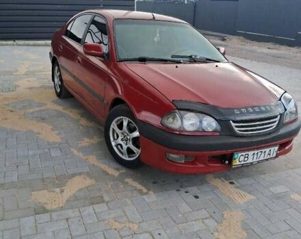 Красный Тойота Авенсис, объемом двигателя 1.8 л и пробегом 319 тыс. км за 3200 $, фото 3 на Automoto.ua