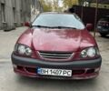 Красный Тойота Авенсис, объемом двигателя 1.8 л и пробегом 306 тыс. км за 3500 $, фото 1 на Automoto.ua