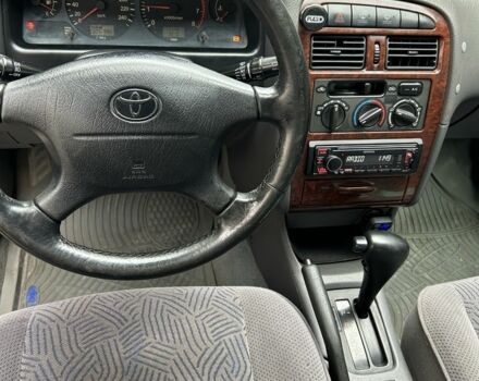 Красный Тойота Авенсис, объемом двигателя 1.8 л и пробегом 306 тыс. км за 3500 $, фото 4 на Automoto.ua