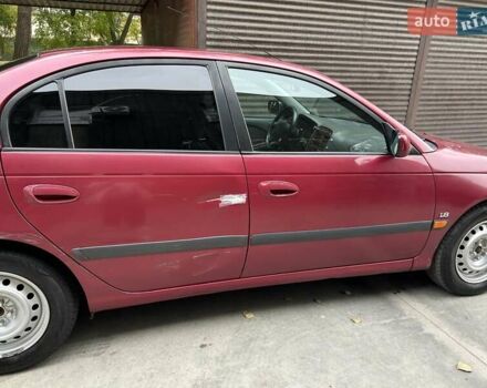 Красный Тойота Авенсис, объемом двигателя 1.76 л и пробегом 306 тыс. км за 3500 $, фото 9 на Automoto.ua