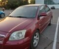 Красный Тойота Авенсис, объемом двигателя 2 л и пробегом 264 тыс. км за 4800 $, фото 1 на Automoto.ua