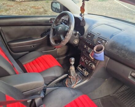 Красный Тойота Авенсис, объемом двигателя 2 л и пробегом 299 тыс. км за 3999 $, фото 4 на Automoto.ua