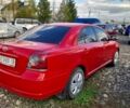 Красный Тойота Авенсис, объемом двигателя 2 л и пробегом 299 тыс. км за 3999 $, фото 2 на Automoto.ua