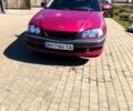 Красный Тойота Авенсис, объемом двигателя 1.8 л и пробегом 437 тыс. км за 3000 $, фото 1 на Automoto.ua