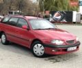 Красный Тойота Авенсис, объемом двигателя 2 л и пробегом 400 тыс. км за 4200 $, фото 1 на Automoto.ua