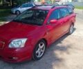 Красный Тойота Авенсис, объемом двигателя 2 л и пробегом 322 тыс. км за 3500 $, фото 1 на Automoto.ua
