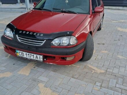 Красный Тойота Авенсис, объемом двигателя 1.8 л и пробегом 319 тыс. км за 3200 $, фото 1 на Automoto.ua