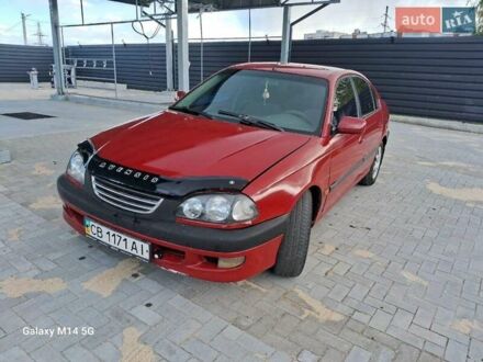 Красный Тойота Авенсис, объемом двигателя 1.8 л и пробегом 319 тыс. км за 3200 $, фото 1 на Automoto.ua