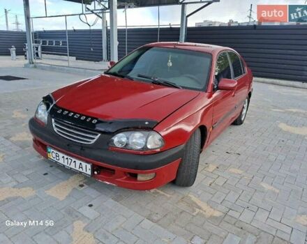 Красный Тойота Авенсис, объемом двигателя 1.8 л и пробегом 319 тыс. км за 3200 $, фото 1 на Automoto.ua