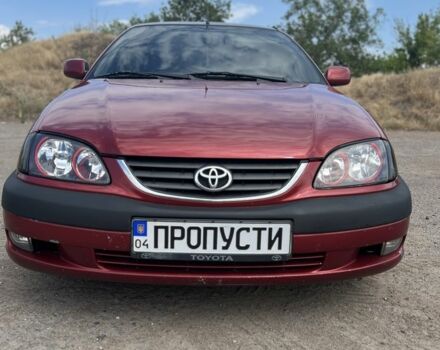 Красный Тойота Авенсис, объемом двигателя 2 л и пробегом 340 тыс. км за 3750 $, фото 1 на Automoto.ua
