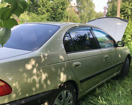 Желтый Тойота Авенсис, объемом двигателя 2 л и пробегом 249 тыс. км за 4000 $, фото 6 на Automoto.ua