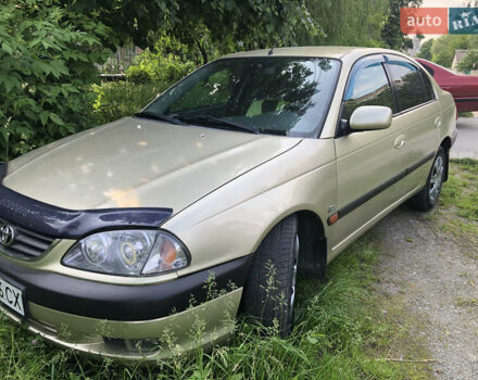 Жовтий Тойота Авенсіс, об'ємом двигуна 2 л та пробігом 249 тис. км за 4000 $, фото 1 на Automoto.ua