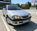Серый Тойота Авенсис, объемом двигателя 1.8 л и пробегом 396 тыс. км за 2600 $, фото 1 на Automoto.ua