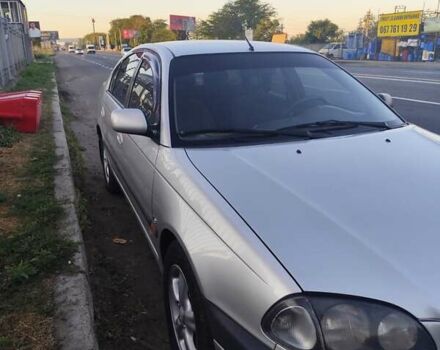 Серый Тойота Авенсис, объемом двигателя 1.76 л и пробегом 350 тыс. км за 3499 $, фото 1 на Automoto.ua